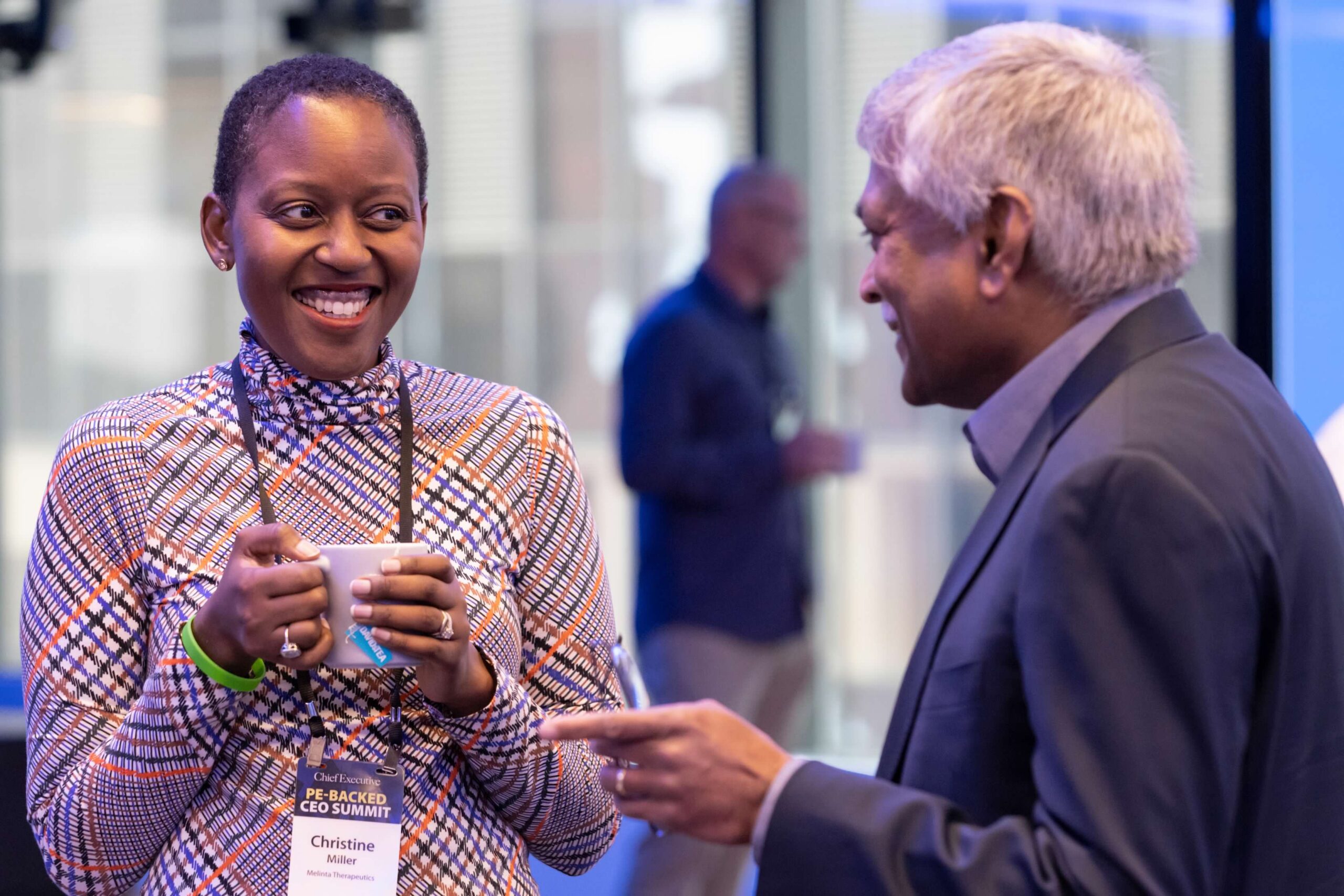 peers networking at a conference